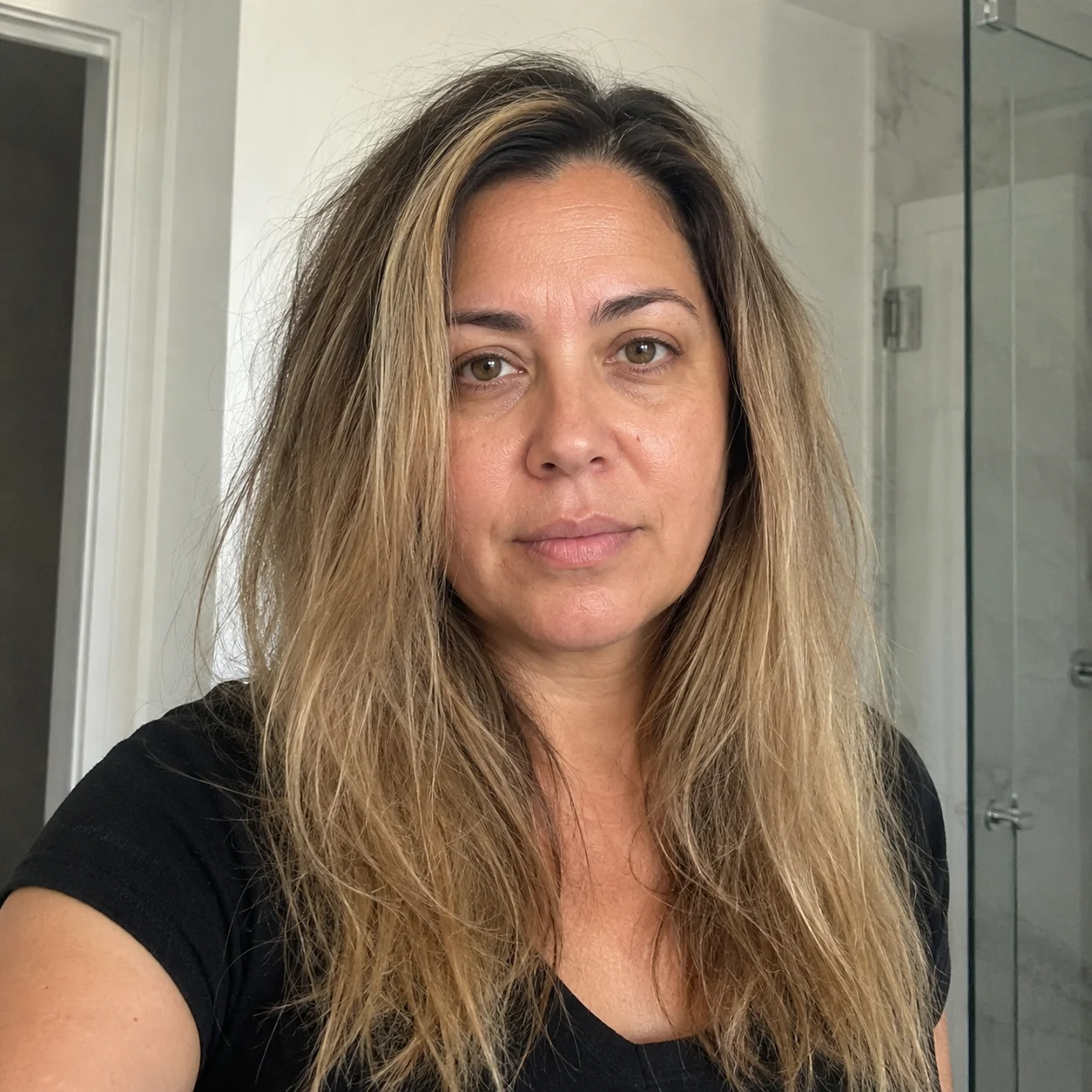 Hair before using the serum capsules — dry and frizzy